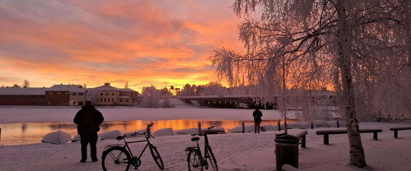 Winter sunset over snowy landscape