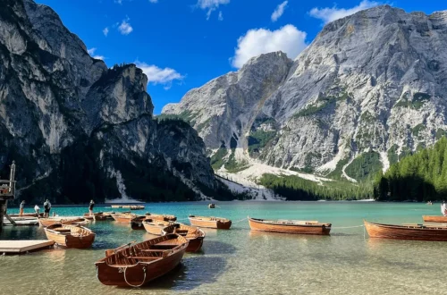 Scenic lake with wooden boats