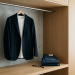 Neatly organized clothing in wardrobe
