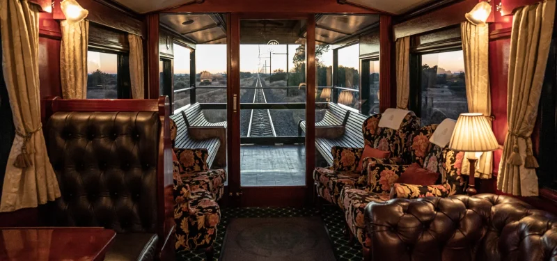 Luxurious train interior with sunset view