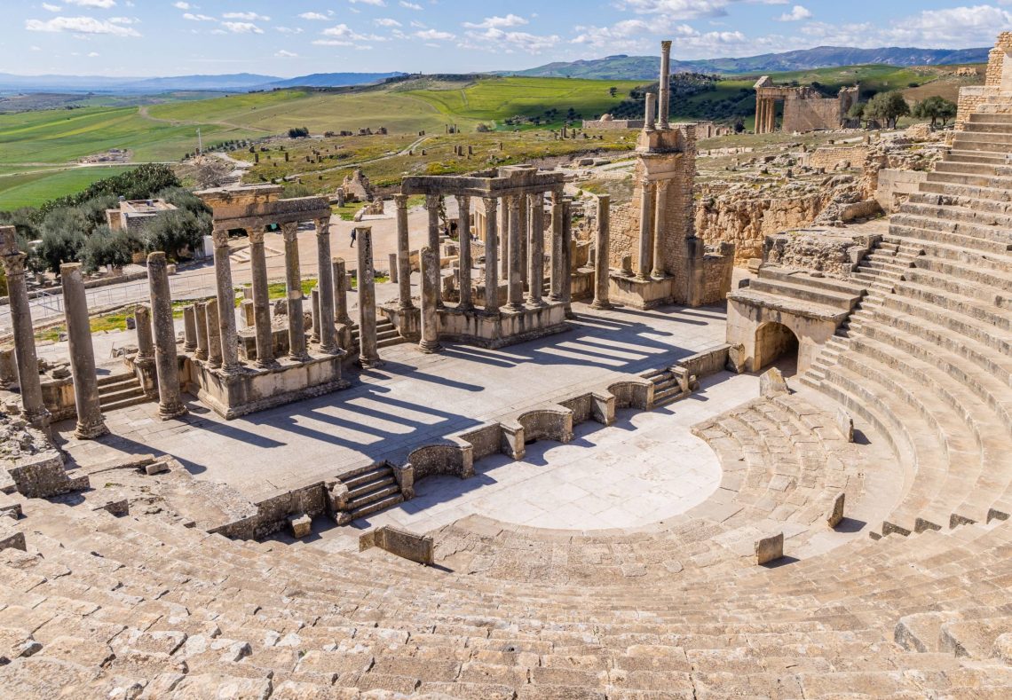 Ancient ruins with scenic landscape backdrop