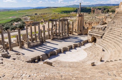 Ancient ruins with scenic landscape backdrop